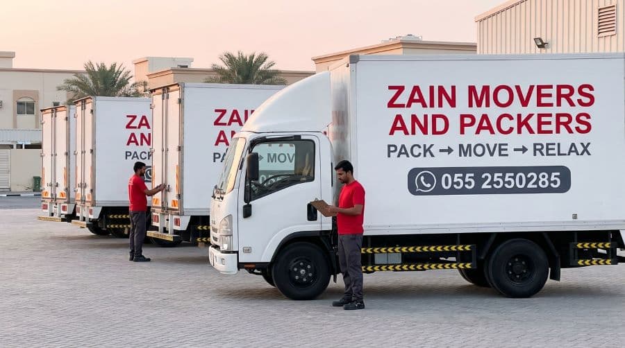 Zain Movers and Packers covered fleet of branded, enclosed trucks dispatching from the depot