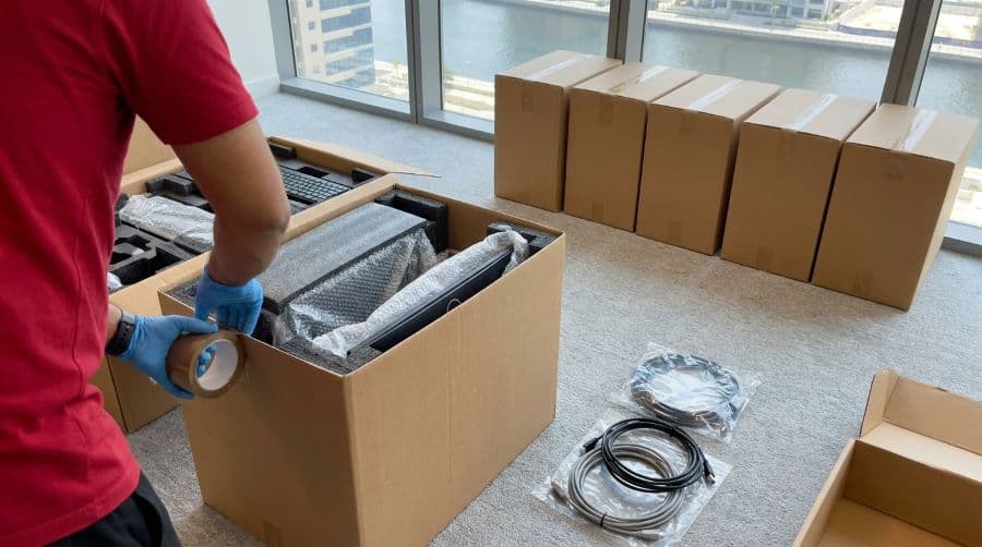 IT equipment packed into secure boxes for a Business Bay office move